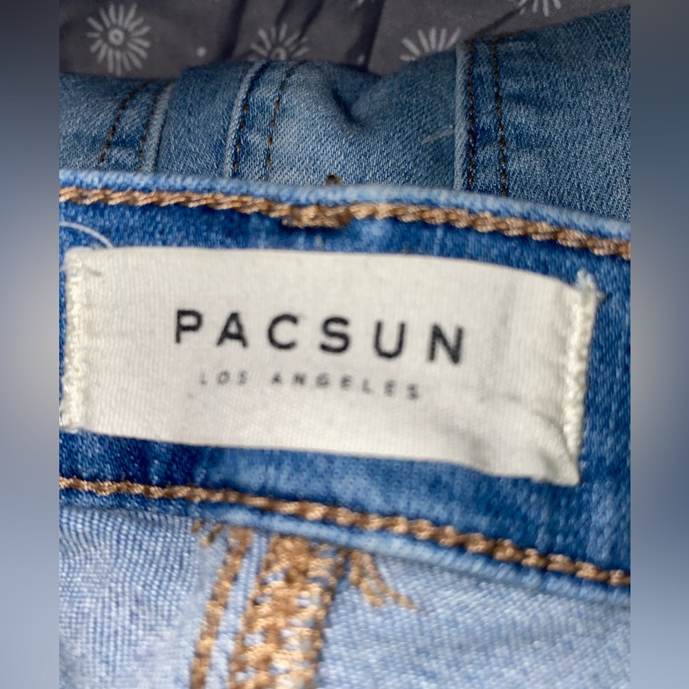Pacsun light washed jeans with dark blue strips down sides/pant legs